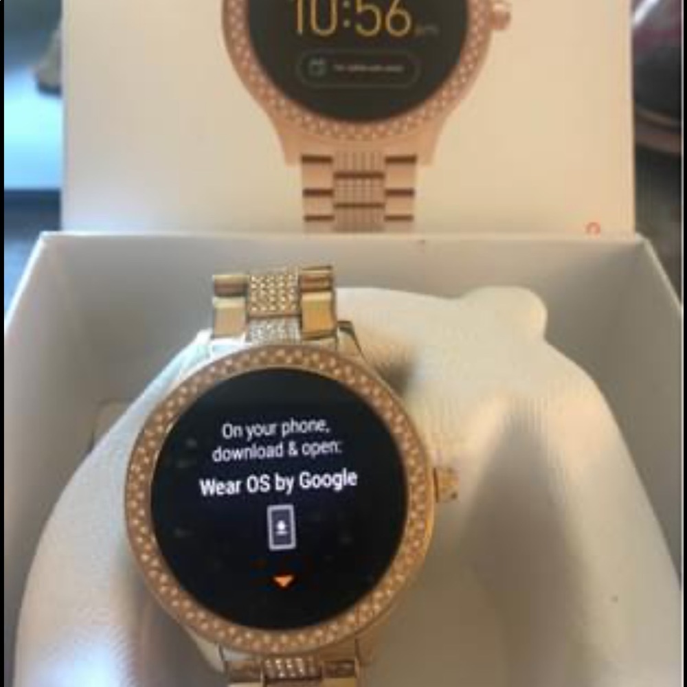 Gold tone Fossil Smartwatch with gems